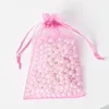 Bolsas de jóias 50 pcs rosa organza saco de cordão bolsa para festival presente pequeno negócio embalagem sabão casamento dia dos namorados