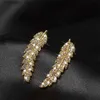 Ear Cuff Ear Cuff 1 paire de magnifiques boucles d'oreilles en plumes boucles d'oreilles à manches grimpeuses luxueuses boucles d'oreilles de mariage en diamant en cristal Y240326