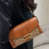 a loja exporta bolsas de grife atacado bolsa de axilas leve luxo pequeno quadrado 2024 novo design de cor de contraste de alta aparência um ombro crossbody