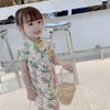 Ubranie etniczne 2-9Y Chińskie Cheongsam dla dziewcząt żółty pawie kwiatowy nadruk hanfu sukienki dla dzieci Krótkie rękawie Qipao Princess Summer Dro otjeh