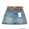 Jupe courte en denim trapèze avec ceinture pour femmes, coupe slim, taille haute, jupe enveloppée dans les fesses, SS7Y, été