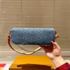 24SS Femme de luxe pour femmes NOUVEAU PAPILLE DE COURTURE COWDE SUR LA CHACHNE IVY DENIM SAG SAVAGE SALLE FEMMES Sac à main Sac Sac Chain