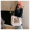 Designer Sacs fourre-tout de mode de luxe Portefeuilles À la mode et minimaliste femme étudiante douce et mignonne toile ours sac fourre-tout polyvalent quotidien unique épaule com