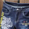 Nuevos hombres Otoño Invierno Tiger Head Jeans bordados Persality Blue Stretch Denim Pants Classic Motorcycle Hip Hop Pantalones z8vx #