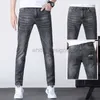 Jeans para hombre de diseñador Jeans Slim Fit Pies Jeans Slim Fit Pantalones europeos Elásticos Pantalones para hombres jóvenes F01K9