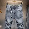 Мужчины новые разорванные повседневные джинсы скинни брюки fi бренд мужская уличная одежда Печата с расстроенной дырой серые джинсовые штаны k55r#