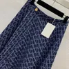 Tecido jeans jacquard com letras clássicas, saia longa de cintura alta com bainha grande