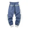 Homens elegantes Harem Pants Estilo Coreano Homens Calças Cargo Multi Bolsos Mid Cintura Lace-up Calças Dring X5NM #