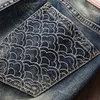 Jeans da uomo ricamati strappati slim fit impilati Pantaloni da denim vintage Distred High Street Patchwork Y2K Pantaloni punk lavorati a maglia w71z #