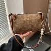 De winkel exporteert designer tassen groothandel high -end kleine vierkante tas voor dames 2024 Nieuwe vintage single schouder crossbody met modieus gedrukt