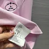 Camiseta de diseñador para mujer Logotipo bordado Cuello de polo Chicas lindas Moda rosada Elegante Verano Para mujer Corto Delgado Manga larga Top Ropa