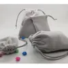 Cadeau cadeau 1000pcs sacs de velours gris bijoux cordon sac 10x13 11x14cm perle cosmétique mariage bonbons conteneur de stockage emballage