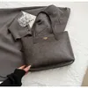 Sklep eksportowy torby projektantów Hurtowa torba na dużą pojemność dla kobiet 2024 NOWOŚĆ moda wszechstronne ramię z zaawansowaną teksturą w klasie dojeżdżać ręczną torbę