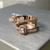 Anéis de banda de luxo cobre com 18k banhado a ouro mover marca designer duplo oval zircão charme camadas anel oco largo para mulheres jóias presente de festa