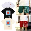 Designer T-shirts Hommes Shorts Femmes Vêtements Graphique T-shirts Motif Tops Été À Manches Courtes Tshirt Hip Hop Lettre Graffiti Imprimer Lâche Rhude Causal Pantalon HVOQ