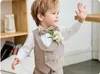 Baby Kids Beaufitul Cuit Flower Boys Luksus urodzinowy Dzieci Formalne spektakle ślubne taniec smoking noszenie 240312