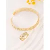 Nuovi modelli di bracciale in oro di vendita caldo Set di anelli portafortuna impermeabili con trifoglio 18 carati per tendenza