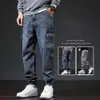 Wiosna Lato Spodnie Mężczyźni Streetwear Loose Denim Joggers Spodnie Multi Pockets Worbgy harem dżinsowe spodnie męskie spodnie dresowe l1tt#