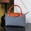 Shop Crossbody Borsa Export a buon mercato femminile 2024 Nuovo gnocchia di alta qualità in edizione a spalla singola di alta qualità piccola vera pelle posteriore in pelle 6m74