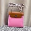 MINI Totes Bolso de diseñador Bolso para mujer Lona de cuero de alta calidad que empalma el bolso de mano Bolso de moda Bolso con forma de casa Bolsos de mano de lujo