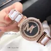 Orologio di marca di lusso da donna ragazza cristallo grandi lettere quadrante stile acciaio matel cinturino da polso orologio da donna di lusso di grande marca pietra di cristallo L 2130