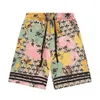 Sommermode, europäische und amerikanische Modemarken, alter Wohnstil, Familienstil, lässige Unisex-Strandshorts mit Blumenmuster für Männer und Frauen