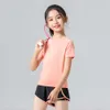 フラッシュ配送夏の新しい女の子ヨガヨガの子供向けランニングエラスティッククイック乾燥Tシャツスポーツビッグボーイズファイススーツ