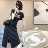 French Style Dress Women in Summer Pleated Waist and Belly Covering for Slimming Effect. Mid Length Slit T-shirt Skirt with A Luxurious Texture