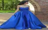 Royal Blue Jumpsuits Lace Prom Dresses Axless Neck pärlor Overkirt Formella aftonklänningar Vestidos de Fiesta Appliced ​​Formal DR5724249