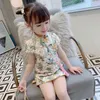 Ubranie etniczne 2-9Y Chińskie Cheongsam dla dziewcząt żółty pawie kwiatowy nadruk hanfu sukienki dla dzieci Krótkie rękawie Qipao Princess Summer Dro otjeh