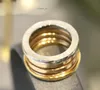 BU Anello a molla Oro Argento Misura USA 5-12 Anello di design placcato oro 18 carati per donna per uomo coppia di altissima qualità regalo di anniversario di lusso in stile classico 037