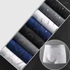 Sous-vêtements 8pcs / lot hommes sexy sous-vêtements boxer shorts lait soie doux confortable tissu mode imprimé respirant antibactérien