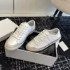 Triomfboog decoratie Zwart en wit Patchwork Platte canvas schoenen met veters Lage casual tennisschoenen Heren dames Luxe designer sneakers Wandelen