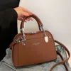 Designer Luxe mode draagtassen Franse nieuwe draagbare damestas 2024 Modetrend High-end Crossbody Shell-tas met enkele schouder