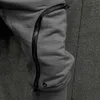 Pantalons pour hommes Pantalons cargo hommes mode couleur unie cordon décontracté multi fermetures à glissière poches pantalon style hip hop hommes sarouel strtwear T240326