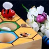 Blokken blokken Montessori Hive Games Board 7pcs bijen met klemplezier plukken vangen speelgoed educatieve beehive baby kinderen ontwikkelingsspeelgoed board t240325