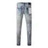 Jeans Purple Brand con fori di vernice American High Street blu fondo bianco