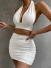 Sexig veckad grimma miniklänning 2 stycken set Deep V backless toppkjolar kostymer Bodycon Women Party Tight Short Suit D014 240312