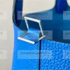 Högkvalitativ 10APC Portable Leather Basket Lock Bag Luxury Design för kvinnor
