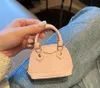 Kvinnors tote -klaff crossbody väskor Kvinnor Läder med Box Mini Shell Bag Keychain Charm Coin Cowhide Card Holder Zippy Pouch for Women's Gift