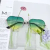 Retro-gradient hjärtformade solglasögon med metallram Kvinnor Eglasvarumärkesdesigner Fashionabla glasögon UV400 Sun Visors 240326