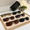 2024 Fashion Small Designer Solglasögon för kvinnor Sacoche Outdoor Sports Small Goggles 71557 New Designer Men Sunglasses Classic Original Box