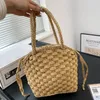 New designer straw woven handbag Luxurious shoulder bag with pearl wrapped camellia design Women Totes Bag Large Capacity Shopping Bag Bucket bag