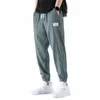 ponadwymiarowe oddychające z jedwabiu dziewięciopunktowe spodnie męskie cienkie lniane luźne luźne spodnie do joggingu Pantging Men Korean Streetwear M9CS#