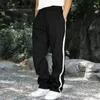 Pantalons pour hommes Sports décontractés Loisirs Hommes Coupe ample Sport à rayures latérales avec taille de cordon pour l'entraînement de gymnastique Jogging