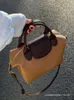 Loja crossbody saco barato exportação grande capacidade para as mulheres 2024 novo e versátil high-end sentir bolsa de ombro bolinhogfqa