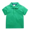 T-shirt de sport pour enfants de style européen et américain T-shirt d'été à manches courtes de couleur unie pour garçons et filles Polos en coton 240326