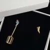 2022 Parrot Bird Cage Brass Asymmetric with Sier Needles, Small and Earrings