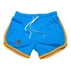 Shorts masculinos estampados fitness cintura elástica bolsos com cordão praia divisão calças curtas malha respirável streetwear