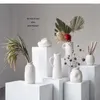 Vases Vase en céramique blanche fleurs séchées accessoires d'arrangement de fleurs accessoires d'art en forme spéciale salon décoration moderne simple